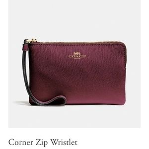 Metallic wine Coach corner Zip wristlet